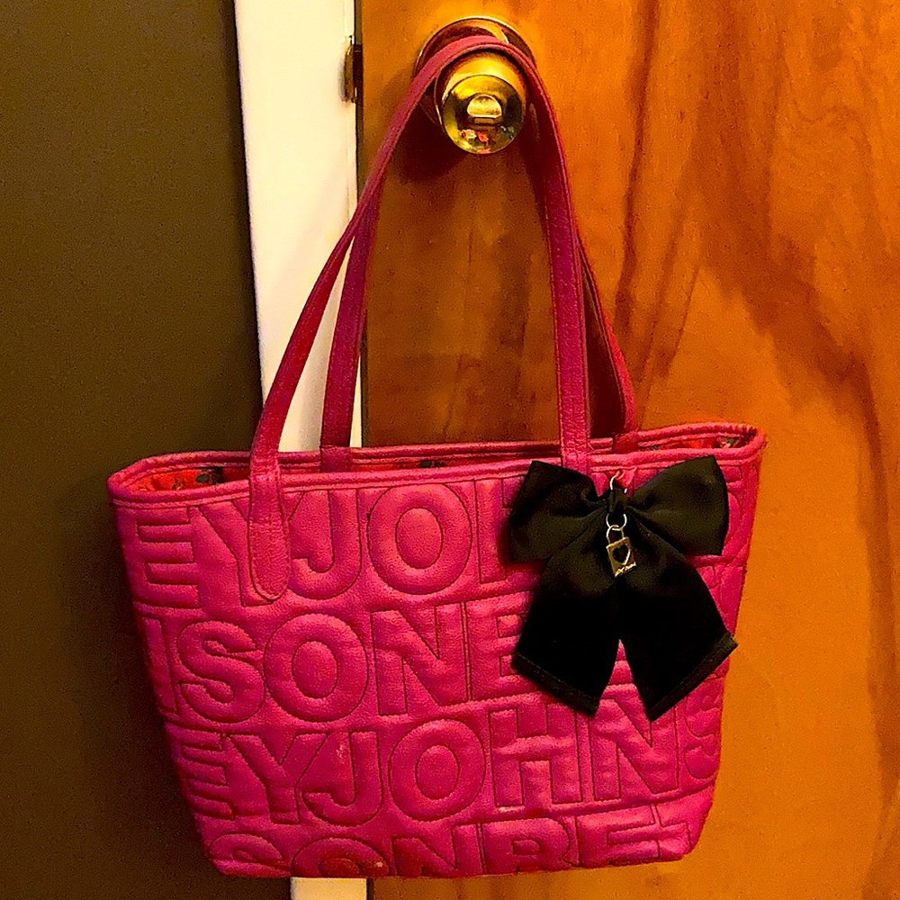 Betsy Johnson embroiders vintage pink purse
